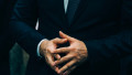 Businessman,Gesturing,With,Hands,During,Speech