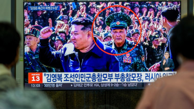 A 24-hour Yonhapnews TV broadcast at Yongsan Railway Station in Seoul showed a news broadcast with file footage of North Korean Kim Yong Bok (in the red circle), deputy chief of the General Staff of the Korean People's Army. A senior officer of North Kore