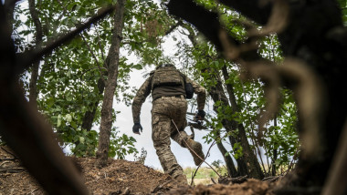 Ukrainian soldiers load FPV drones with explosives in Pokrovsk area to strike Russian positions