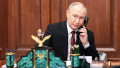 Moscow, Russia. 07th May, 2024. Russian President Vladimir Putin takes a call in his office prior to departing for his inauguration ceremony at the Kremlin, May 7, 2024 in Moscow, Russia. Putin was sworn in for his fifth term putting him on track to be th