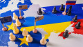 Eu,,Usa,And,Russian,Flags,With,Chess,Pieces,Symbolizing,The