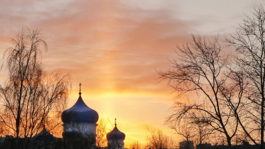 domes of the Orthodox Church on the background of the sunset.