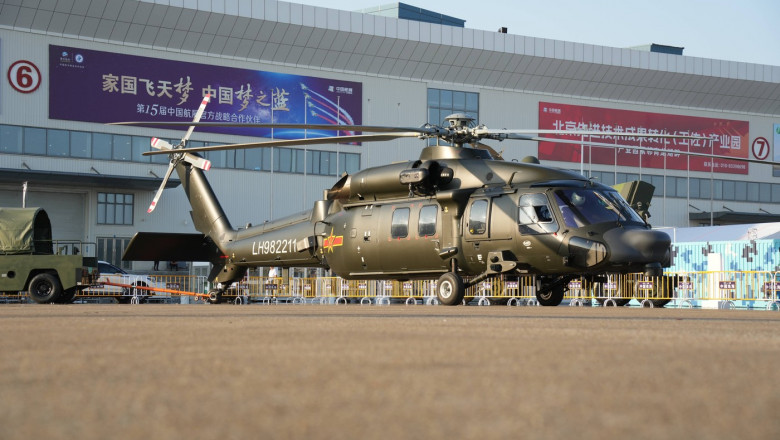 ZHUHAI, CHINA - NOVEMBER 07: China s Z-20 medium-lift utility helicopter arrives in Zhuhai ahead of the 15th China Inter