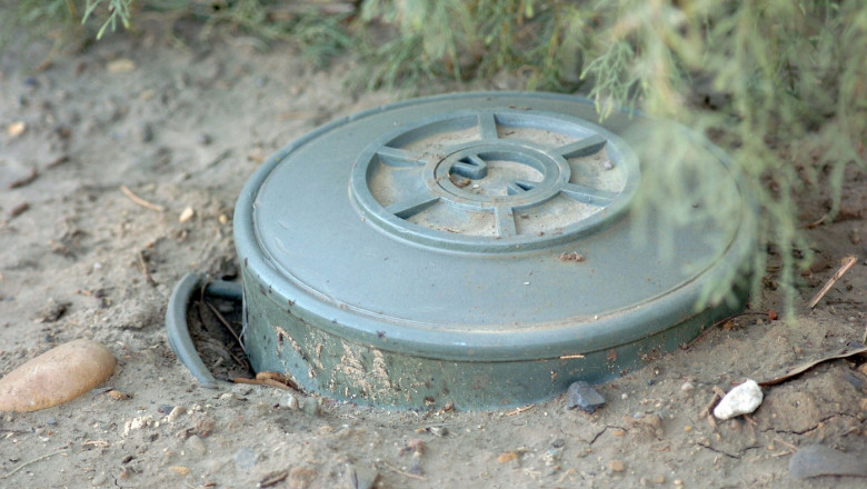 A land mine is a target (person or vehicle) triggered explosive weapon