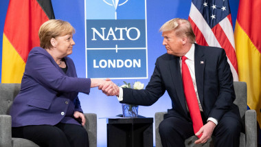 Watford, United Kingdom. 04 December, 2019. U.S. President Donald Trump and German Chancellor Angela Merkel hold a bilateral meeting on the sidelines of the NATO Summit December 4, 2019 in Watford, Hertfordshire, United Kingdom. Credit: Shealah Craighea