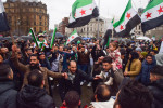 Syrians celebrate the toppling of Bashar al Assad regime in Trafalgar Square