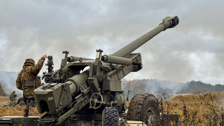 Italian Army soldiers assigned to Field Artillery Regiment a Cavallo fire live rounds with the 155mm FH70 howitzer during the Dynamic Front 25 exercise on Grafenwhr Training Area, Bavaria, Germany, Nov. 19, 2024. Dynamic Front increases the lethality of t