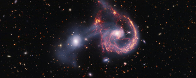 Spectacular image of galaxies colliding forms watchful eyes