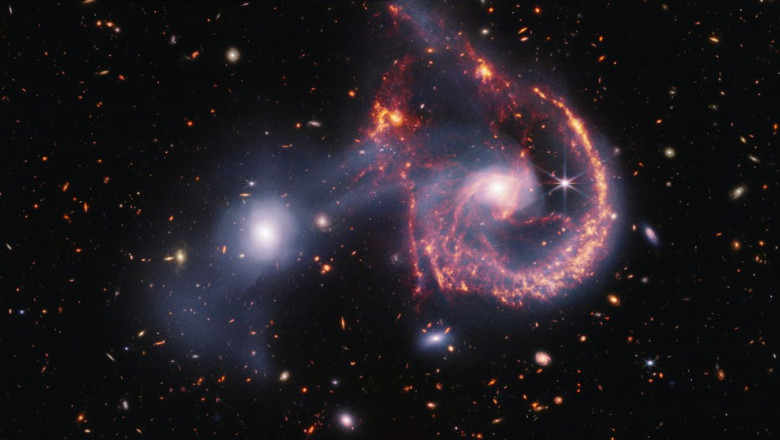 Spectacular image of galaxies colliding forms watchful eyes