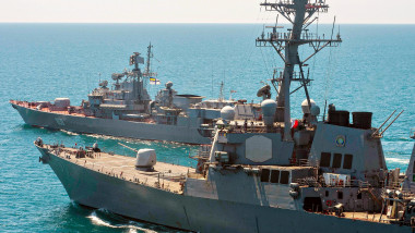 The US Navy guided-missile destroyer USS Ross steams alongside the Ukranian Navy Frigate Hetman Sahaydachniy during training operations with the June 2, 2015 in the Black Sea.