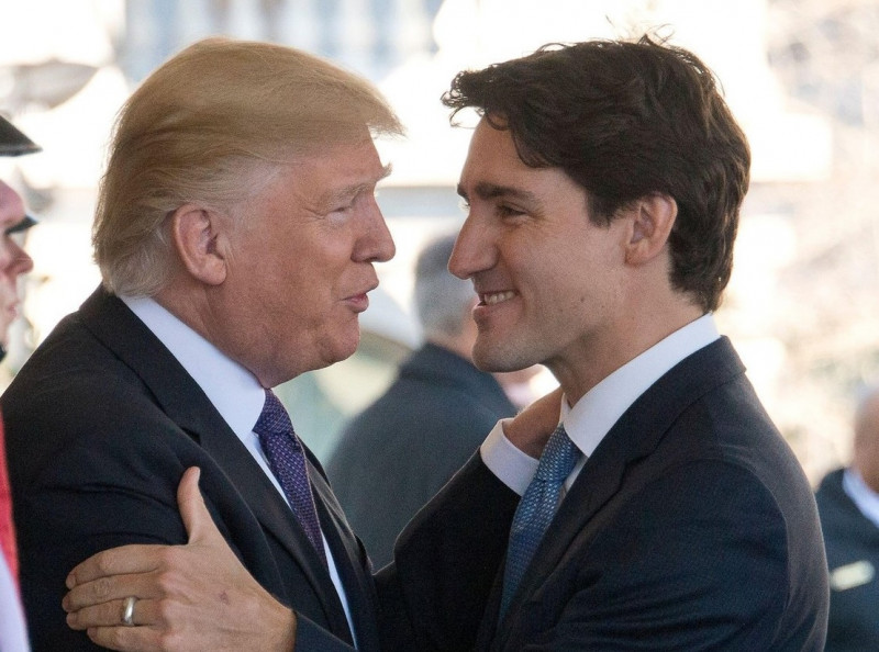 **FILE PHOTO** Canadian Prime Minister Justin Trudeau Tests Positive for Covid-19. United States President Donald J. Trump welcomes Prime Minister Justin Trudeau of Canada to the White House in Washington, DC on Monday, February 13, 2017. Credit: Ron Sach