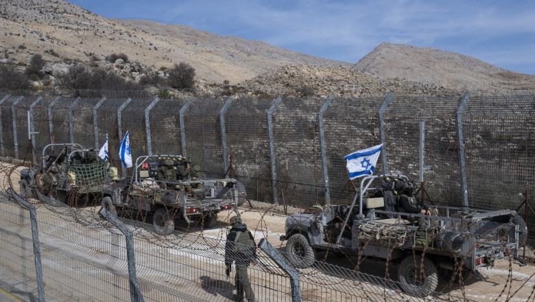 Israeli soldiers at the Golan Heights border with Syria