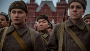 Moscow, Russia. 8th November, 2024. People wearing WWII-era uniform take part in a theatrical performance at an open-air museum in Red Square, dedicated to the history of the defense of Moscow. The exposition marks the 83rd anniversary of the historical 7