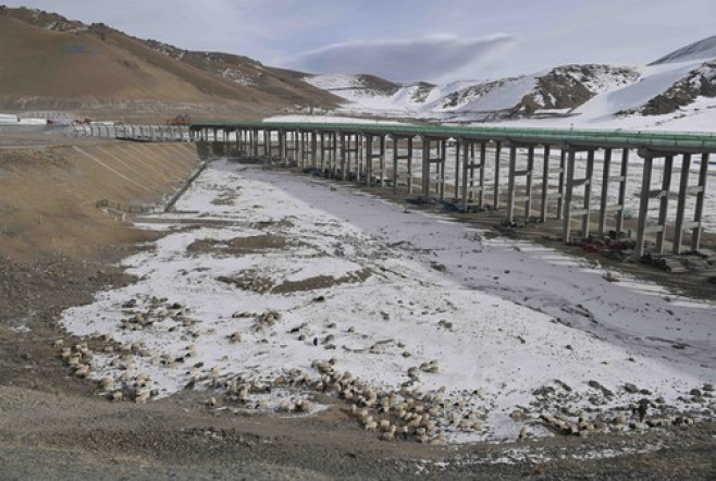 FOCUS | China's Xinjiang completes world's longest expressway tunnel through challenging mountains