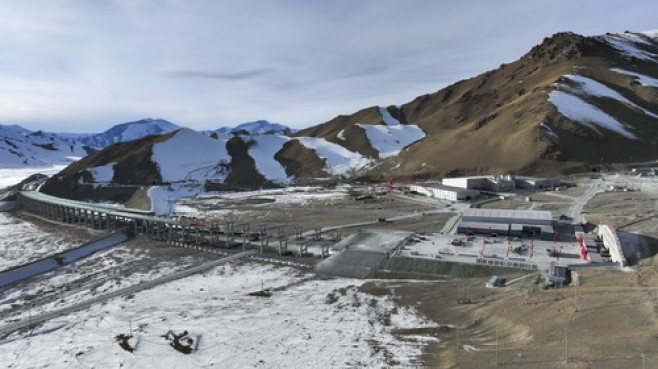 FOCUS | China's Xinjiang completes world's longest expressway tunnel through challenging mountains