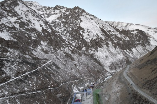 FOCUS | China's Xinjiang completes world's longest expressway tunnel through challenging mountains