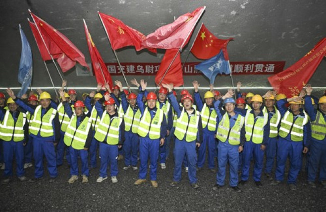 FOCUS | China's Xinjiang completes world's longest expressway tunnel through challenging mountains