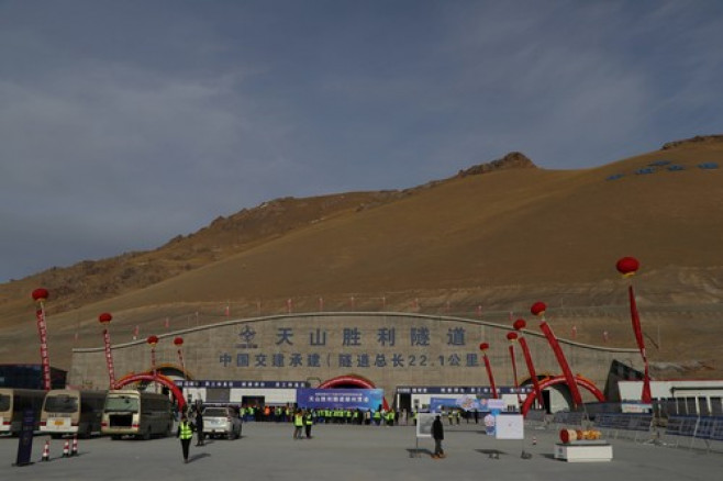 HEJING, CHINA - DECEMBER 30: Workers are seen at the construction site of the Tianshan Shengli Tunnel, the world s longe