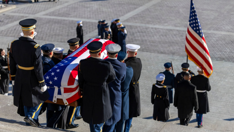 Body Of Former President Jimmy Carter Departs Capitol Building After Lying In State