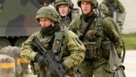Lithuanian army soldiers in full combat gear take part in urban assault training during NATO exercise Combined Resolve II May 17, 2014 at Hohenfels Army base, Germany.