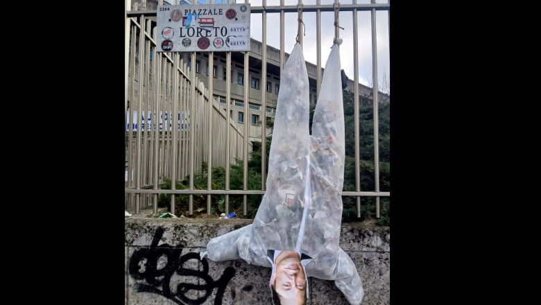 Italy, Milan: Students hang Elon Musk puppet upside down in Piazzale Loreto where the corpses of Mussolini, his mistress Claretta Petacci, and his henchmen where hanged on public display, April 29, 1945..The action of students was following Musk's suppose