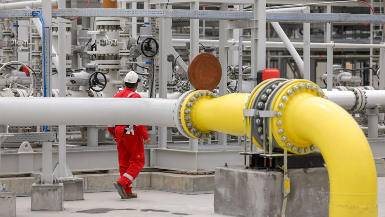 Vadu, Romania - June 28, 2022: Engineer works at a gas treatment plant.