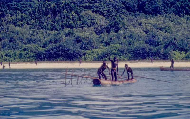 Negrito tribe people in boat Andaman and Nicobar Islands India Asia