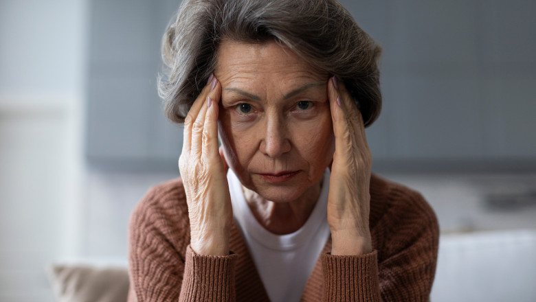 Sad,Elderly,Woman,Touching,Temples,,Feeling,Unwell,,High,Blood,Pressure,
