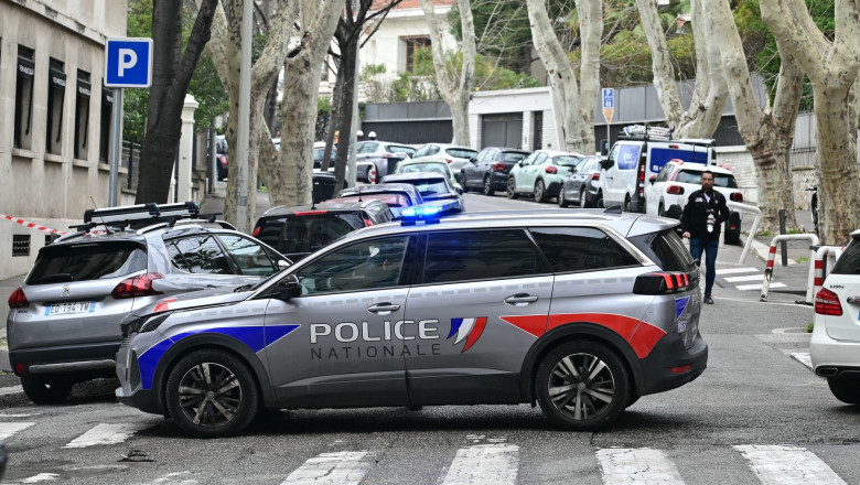 A French National Police car blocks off a street in front of the Russian consulate in Marseille