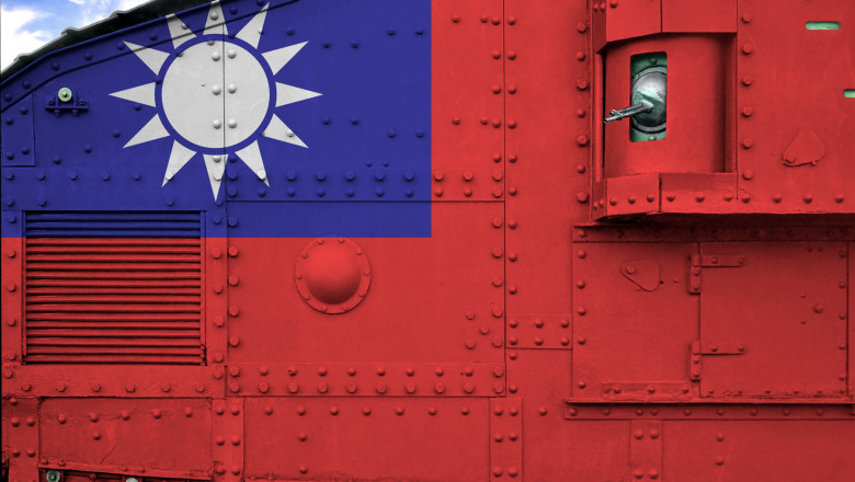Taiwan flag depicted on side part of military armored tank closeup. Army forces conceptual background