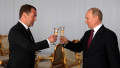 Dmitry Medvedev and Vladimir Putin toasting champaigne