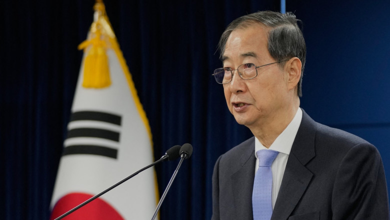 South Korean acting President Han Duck-soo speaks during a briefing at the Government Complex in Seoul