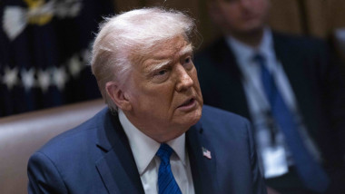 US President Donald J. Trump delivers remarks to the news media during an Ambassador meeting