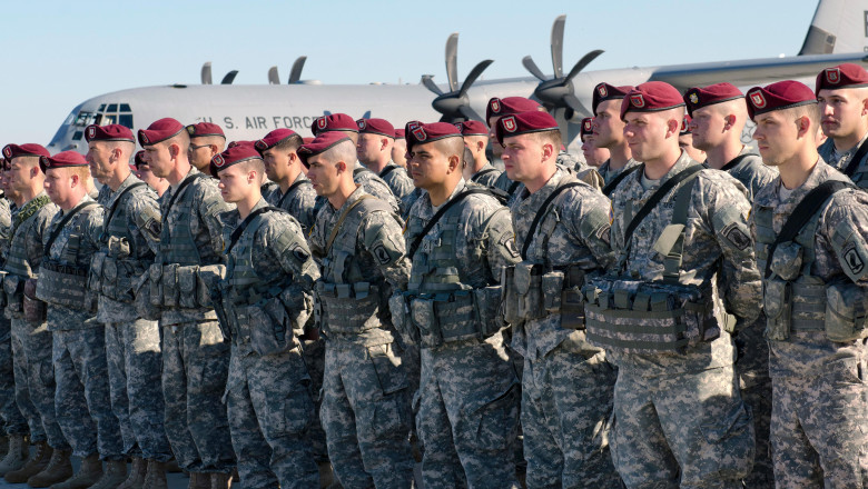 US Army paratroopers with the 173rd Airborne Brigade Combat Team stand in formation after arriving April 26, 2014 in Siauliai, Lithuania. The soldiers were deployed to Lithuania, Poland, Latvia and Estonia as tensions with Russia rise over Ukraine.
