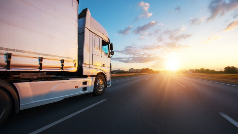 European,Truck,Driving,On,The,Asphalt,Road,In,Rural,Landscape