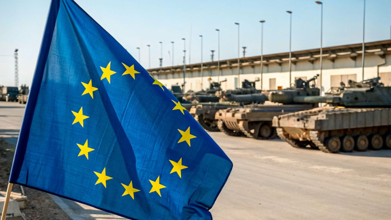 The flag of the European Union flies at a NATO military base. Stockpiles of military equipment against the background of the blue EU flag. AI Photos