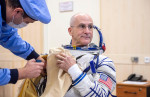 Baikonur, Kazakhstan. 11 September, 2024. NASA astronaut Don Pettit is helped into his Russian Sokol space suit before departing to the Soyuz MS-26 spacecraft on launch day at the Baikonur Cosmodrome, September 11, 2024, in Baikonur, Kazakhstan. The Exped