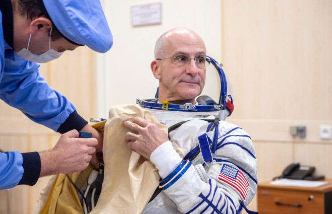 Baikonur, Kazakhstan. 11 September, 2024. NASA astronaut Don Pettit is helped into his Russian Sokol space suit before departing to the Soyuz MS-26 spacecraft on launch day at the Baikonur Cosmodrome, September 11, 2024, in Baikonur, Kazakhstan. The Exped