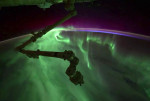 Astronaut captures mind-blowing green aurora over Earth