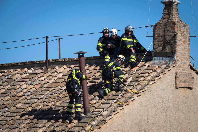 A view of the chimney preparation in the conclave on the roof of the Sistine Chapel.