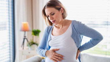 A,Portrait,Of,Pregnant,Woman,Indoors,At,Home,,Feeling,Tired.