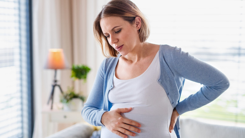 A,Portrait,Of,Pregnant,Woman,Indoors,At,Home,,Feeling,Tired.