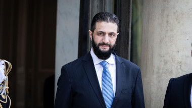 Paris, France. 07th May, 2025. Ahmed al-Sharaa, Syria's interim President, seen at the entrance of the Elysee Presidential Palace during the meeting. The French President met with the Ahmed al-Sharaa, Syria's Interim President at the Elysee Presidential P