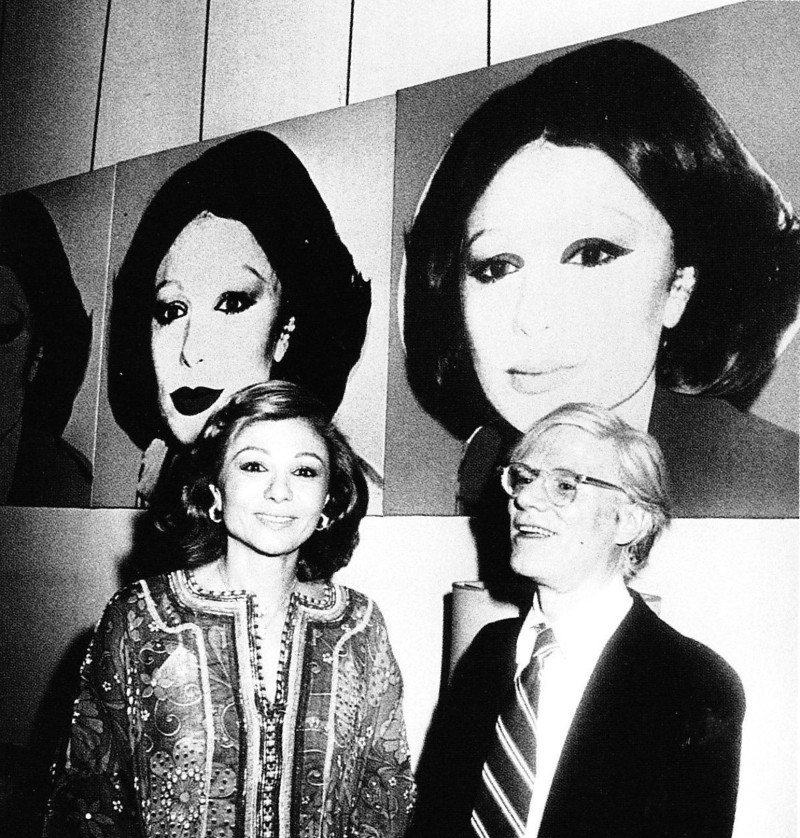 In 1977, Farah Pahlavi, the Queen of Iran, and artist Andy Warhol are pictured together at the Tehran Museum of Contemporary Art. This meeting highlights the intersection of art and political culture during a pivotal moment in Iran's history.