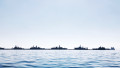 Boats Sailing In Sea Against Clear Sky