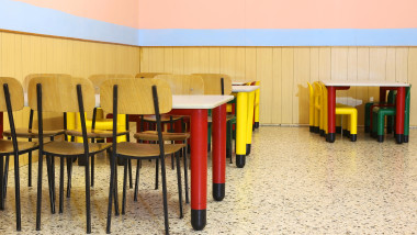 large nursery lunchroom with small chairs and small dining table