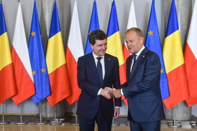 Nicușor Dan a fost întâmpinat la sediul guvernului de la Varșovia de premierul polonez Donald Tusk