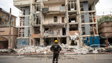 Ukraine: Workers Clear Damage From Attack in Kyiv