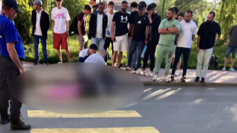 femeie impuscata pe strada