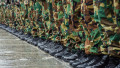 Military,Boots,And,Camouflage,Trousers,Of,Many,Soldiers,In,Uniform